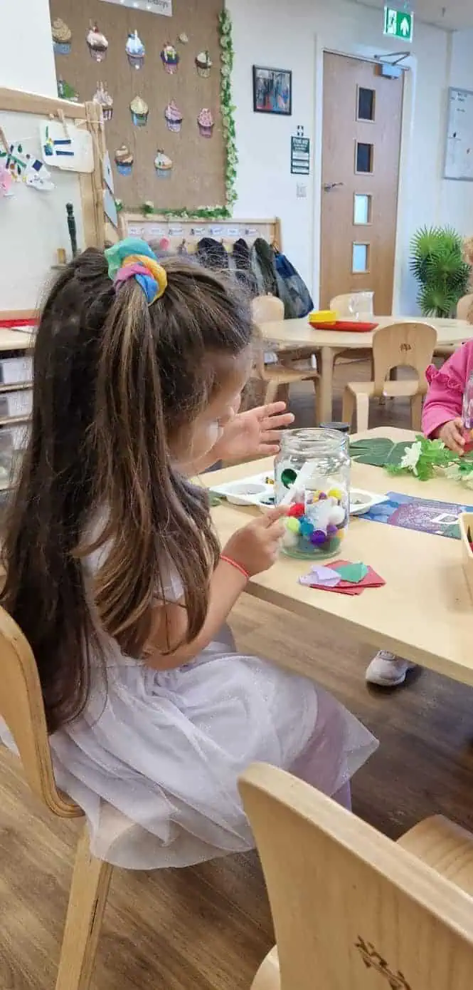 nursery child filling her dream jar