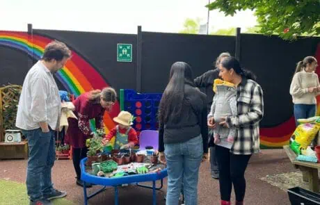 Families planting at Greenford nursery